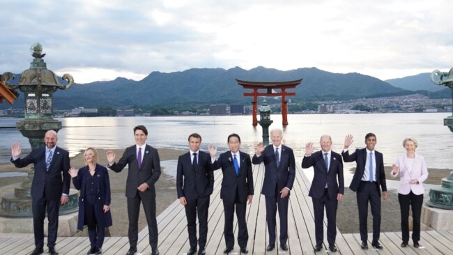 Leaders of G7 nations and European Commission President Ursula von der Leyen pose for a photo during a visit to the Itsukushima Shrine in Miyajima Island as part of the G7 Leaders' Summit in Japan, May 19, 2023.