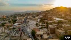 Aaerial general view of the old Midyat town in Mardin province, southeastern Turkey, July 1, 2024. Archaeologists stumbled upon the city-under-a-city 'almost by chance' after an excavation of house cellars led to the discovery of a vast cave system.