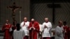 Pope Francis presides at the Good Friday Passion of the Lord service in Saint Peter's Basilica at the Vatican, April 7, 2023.