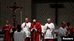 Pope Francis presides at the Good Friday Passion of the Lord service in Saint Peter's Basilica at the Vatican, April 7, 2023.