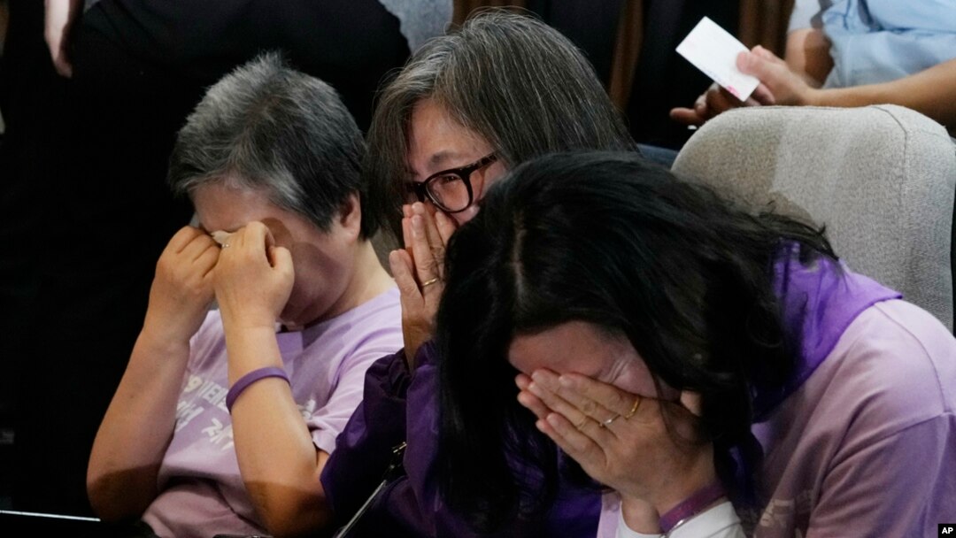 Bereaved family members of the victims of the Halloween crush in 2022 react at the National Assembly in Seoul, South Korea, May 2, 2024. 