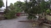 A tree lays across a street in Quelimane, Mozambique, March 12, 2023. Record-breaking Cyclone Freddy made its second landfall in Mozambique Saturday night, pounding the southern African nation with heavy rains and disrupting transport and telecommunications services.
