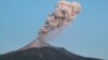 This handout photo taken and released by the Geological Agency of Indonesia on June 2, 2024 shows a volcanic eruption from Mount Lewotobi Laki-laki in East Flores, East Nusa Tenggara. (Photo by Handout / Geological Agency of Indonesia / AFP) 