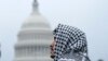 A man wearing a keffiyeh attends a pro-Palestinian rally near the U.S. Capitol in Washington, May 18, 2024.