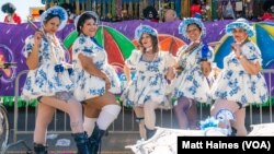 Members of the Mahogany Blue Baby Dolls during a 2023 Carnival season parade in New Orleans. In the early 20th century, Baby Dolls were often African American sex workers who made an effort to integrate Mardi Gras. Today, Baby Doll culture is experiencing a revival.