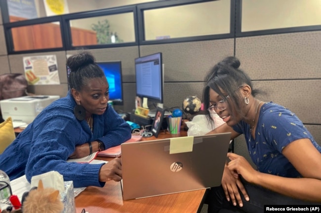 FILE - Success Coach Latasha Wiley, left, helps first-year student Amare Porter, right, with her class schedule at Chattahoochee Valley Community College's advising center on Feb. 23, 2023. (Rebecca Griesbach/Press-Register via AP)