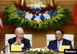 U.S. President Joe Biden meets with Vietnam's Prime Minister Pham Minh Chinh in Hanoi, Sept. 11, 2023.