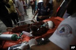 On April 20, 2024, a Palestinian young man injured in the Israeli bombing of the Gaza Strip was taken to a Kuwaiti hospital in the Rafah refugee camp in the southern Gaza Strip.