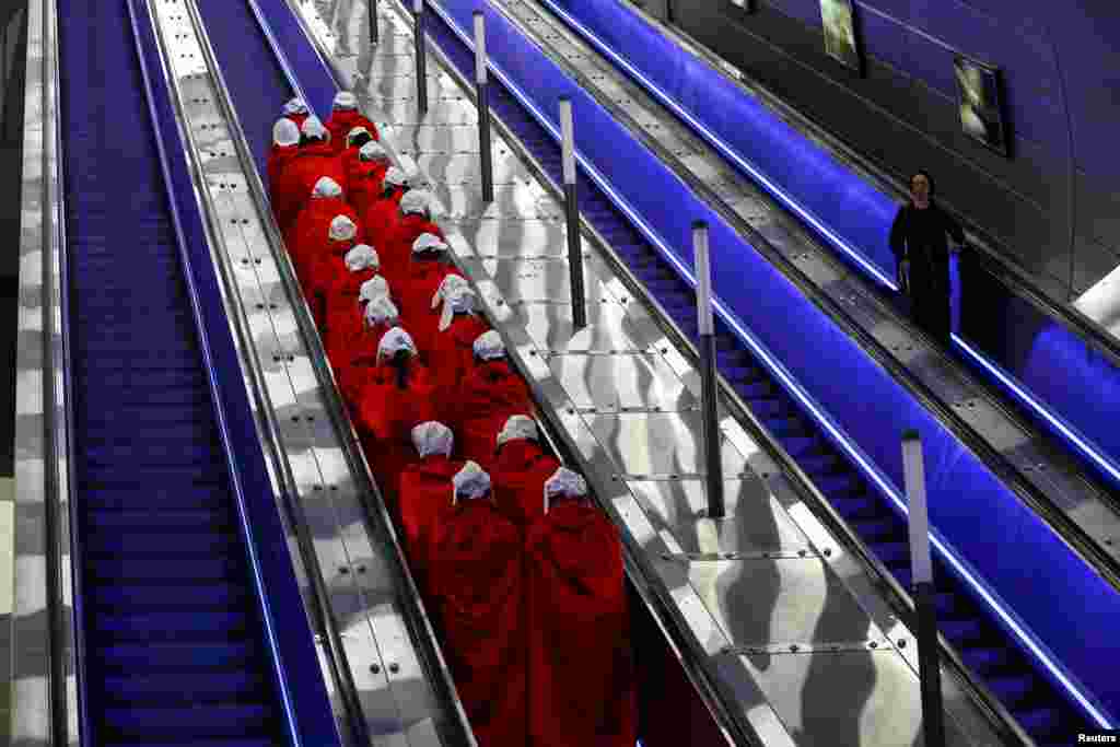 Women dressed as handmaidens from &quot;The Handmaid&#39;s Tale&quot;&nbsp;TV series arrive by train in Jerusalem to demonstrate as Israeli Prime Minister Benjamin Netanyahu&#39;s nationalist coalition government presses on with its judicial changes.