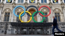 FILE: The Olympic rings are seen in front of the Hotel de Ville City Hall in Paris, France. Taken March 14, 2023.