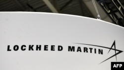Logo dari perusahaan Lockheed Martin terlihat pada acara International Astronautical Congress di the Walter E. Washington Convention Center di Washington, pada 22 Oktober 2019. (Foto: AFP/Mandel Ngan)