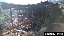 စစ်ကောင်စီတပ် လက်နက်ကြီးပစ်ခတ်မှုကြောင့် ပျက်စီးမှုဖြစ်နေသည့် ဖယ်ခုံမြို့နယ် တနေရာ။ (Photo: ပြည်သူ့အုပ်ချုပ်ရေးအဖွဲ့ ဖယ်ခုံမြို့နယ်)
