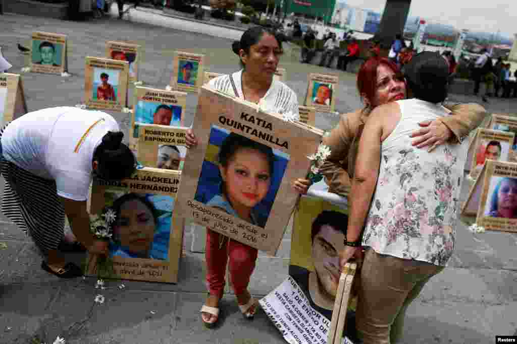 Relatives take part in a protest ahead of the International Day of the Victims of Enforced Disappearances, in San Salvador, El Salvador, Aug. 29, 2023. 