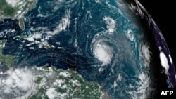 Hurricane Lee swirls in the Atlantic Ocean, Sept. 7, 2023. Dangerous surf conditions set off by the storm will likely affect the Virgin Islands, Puerto Rico, Hispaniola, the Bahamas and Bermuda over the weekend, the National Hurricane Center said. (NOAA) 