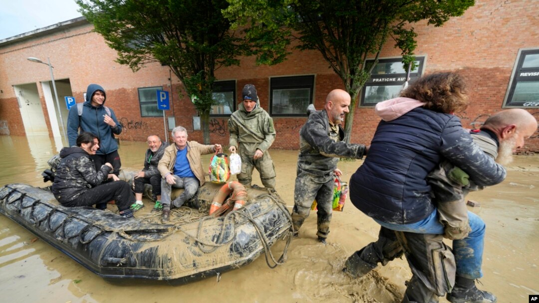 People are rescued in Faenza, Italy, May 18, 2023. 