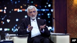 Presidential candidate Saeed Jalili, former Iran's top nuclear negotiator, speaks in a debate of the candidates at the TV studio in Tehran, Iran, June 17, 2024, in this picture made available by Iranian state-run TV, IRIB.