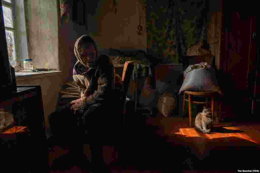 Paraskevia, 73, lives just 3 kilometers from the front lines. Shelling is constant, and she says she&rsquo;s scared. Despite all the danger, she is staying in her home in Ocheretyno, March 4, 2024.