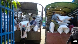 FILE- Image from the World Food Program shows relief food commodities being stockpiled at WFP warehouses in Rakhine State, April 21, 2021.