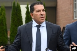 FILE - Lawyer Joseph Tacopina speaks during a news conference in Schoharie, New York, Sept. 2, 2021.