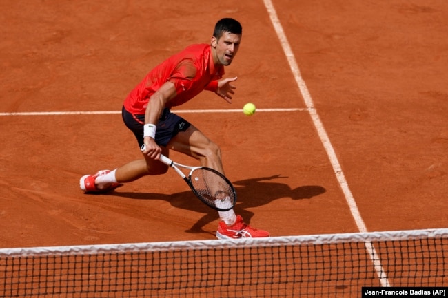 Serbia's Novak Djokovic plays a shot against Norway's Casper Ruud during their final match of the French Open tennis tournament at the Roland Garros stadium in Paris, Sunday, June 11, 2023. (AP Photo/Jean-Francois Badias)