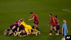 Spain's players celebrate after defeating England during the Women's World Cup soccer final at Stadium Australia in Sydney, Aug. 20, 2023.