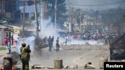 FILE: In a previous protest,rRiot police disperse supporters of Kenya's opposition leader Raila Odinga of the Azimio La Umoja (Declaration of Unity) One Kenya Alliance, as part of a nationwide protest against President Ruto and inflation, in Kisumu, Kenya March 30, 2023.