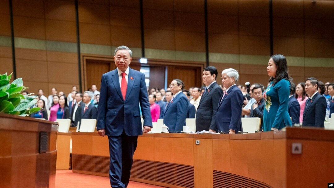 General To Lam walks to the podium to swear in as the Vietnamese president at the National Assembly in Hanoi, Vietnam, May 22, 2024. 