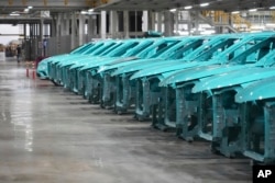 Car frames are lined up at a Vinfast factory in Hai Phong, Vietnam, on Sept. 29, 2023.