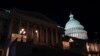 Lights illuminate the U.S. Capitol after House Speaker Kevin McCarthy announced that he and President Joe Biden had reached an "agreement in principle" to resolve the looming debt crisis on May 27, 2023, in Washington. 
