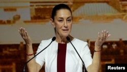 FILE - Mexican President-elect Claudia Sheinbaum holds a meeting with elected federal legislators at the World Trade Center in Mexico City, Mexico, June 18, 2024.