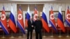 In this pool photograph distributed by the Russian state agency Sputnik, Russia's President Vladimir Putin shakes hands with North Korea's leader Kim Jong Un during a meeting in Pyongyang on June 19, 2024. (Gavriil Grigorov/ Pool / AFP) 