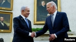 U.S. President Joe Biden meets with Israeli Prime Minister Benjamin Netanyahu in the Oval Office July 25, 2024. REUTERS