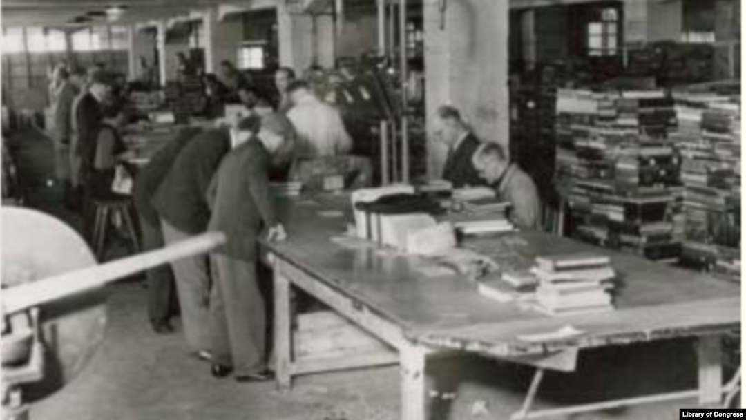 The Offenbach Archival Depot, where books, manuscripts and archival materials taken by the Nazis during World War II were sorted and returned to their country of origin or maintained in new collections, 1946.
