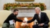 FILE - President Joe Biden shakes hands with Ukrainian President Volodymyr Zelenskyy as they meet in the Oval Office of the White House, Tuesday, Dec. 12, 2023, in Washington.