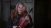 Violinist on Russian Trains Soothes Weary Commuters