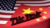 Biểu tượng TikTok được đặt trên cờ Mỹ và cờ Trung Quốc (ảnh chụp ngày 25/4/2024)