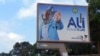 A defaced billboard of Gabon President Ali Bongo Ondimba is seen on an empty street in Libreville, Aug. 30, 2023. Mutinous soldiers said on state television that they had seized power and were overturning the results of the recent presidential election.