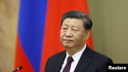 Китайський лідер Сі Цзіньпін під час візиту до Москви, 21 березня 2023. Sputnik/Dmitry Astakhov/Pool