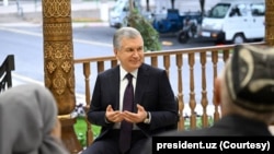 Uzbek President Shavkat Mirziyoyev meets with residents of Tashkent, Uzbekistan, May 12, 2023. 