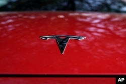 The Tesla emblem on a vehicle in Austin, Texas, Feb. 22, 2023.