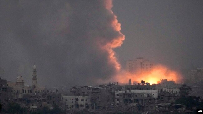 Smoke rises following an Israeli airstrike in the Gaza Strip, as seen from southern Israel, Oct. 14, 2023.