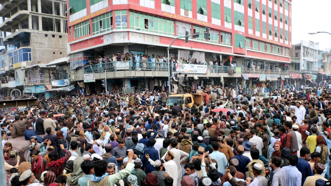 Afghan cricket fans celebrate their team's victory during the men's T20 World Cup cricket match between Afghanistan and Bangladesh, in the city of Khost province eastern of Afghanistan, June. 25, 2024.
