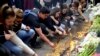 Shocked Serbians Mourn Victims of Belgrade School Shooting