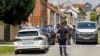 Police and forensics gather near the crime scene in Daruvar, central Croatia, July 22, 2024. 