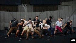 Dancers rehearse for "Dance of the Games" at the concert hall in Creteil, east of Paris, July 31, 2024.