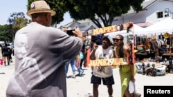 People celebrate Juneteenth — which commemorates the end of slavery in Texas more than two years after the 1863 Emancipation Proclamation freed slaves elsewhere in the U.S. — in Los Angeles, California, June 19, 2024.