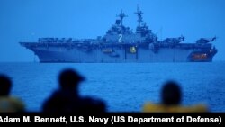 FILE — The USS Essex (LHD-2) in the Gulf of Thailand, March 2, 2011. A sailor assigned to the USS Essex was charged on Oct. 10, 2023, with providing details about the weapons systems and aircraft aboard the ship.
