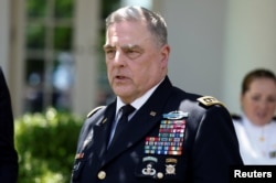 U.S. Chairman of the Joint Chiefs of Staff Mark Milley, whose four-year term as Joint Chiefs chair ends this fall, attends an event in the Rose Garden at the White House, May 25, 2023.