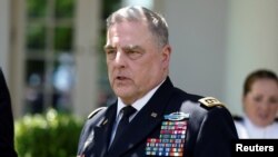 FILE - U.S. Joint Chiefs Chairman Gen. Mark Milley attends an event in the Rose Garden at the White House, May 25, 2023.