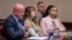 Hannah Gutierrez-Reed, center, prepares for a sentencing hearing in state district court in Santa Fe, New Mexico, April 15, 2024. (Eddie Moore/The Albuquerque Journal via AP, Pool)